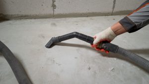 Can You Apply Epoxy Over Old Carpet Glue, or Must the Concrete Be Fully Clean?