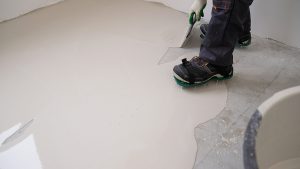 Is It Possible to Correct Garage Floor Slope Without Replacing the Slab?